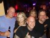 Good friends & regulars at the Purple Moose grab a photo w/ bartender Bobby: Maury, Nikki, Bev & Tim.
